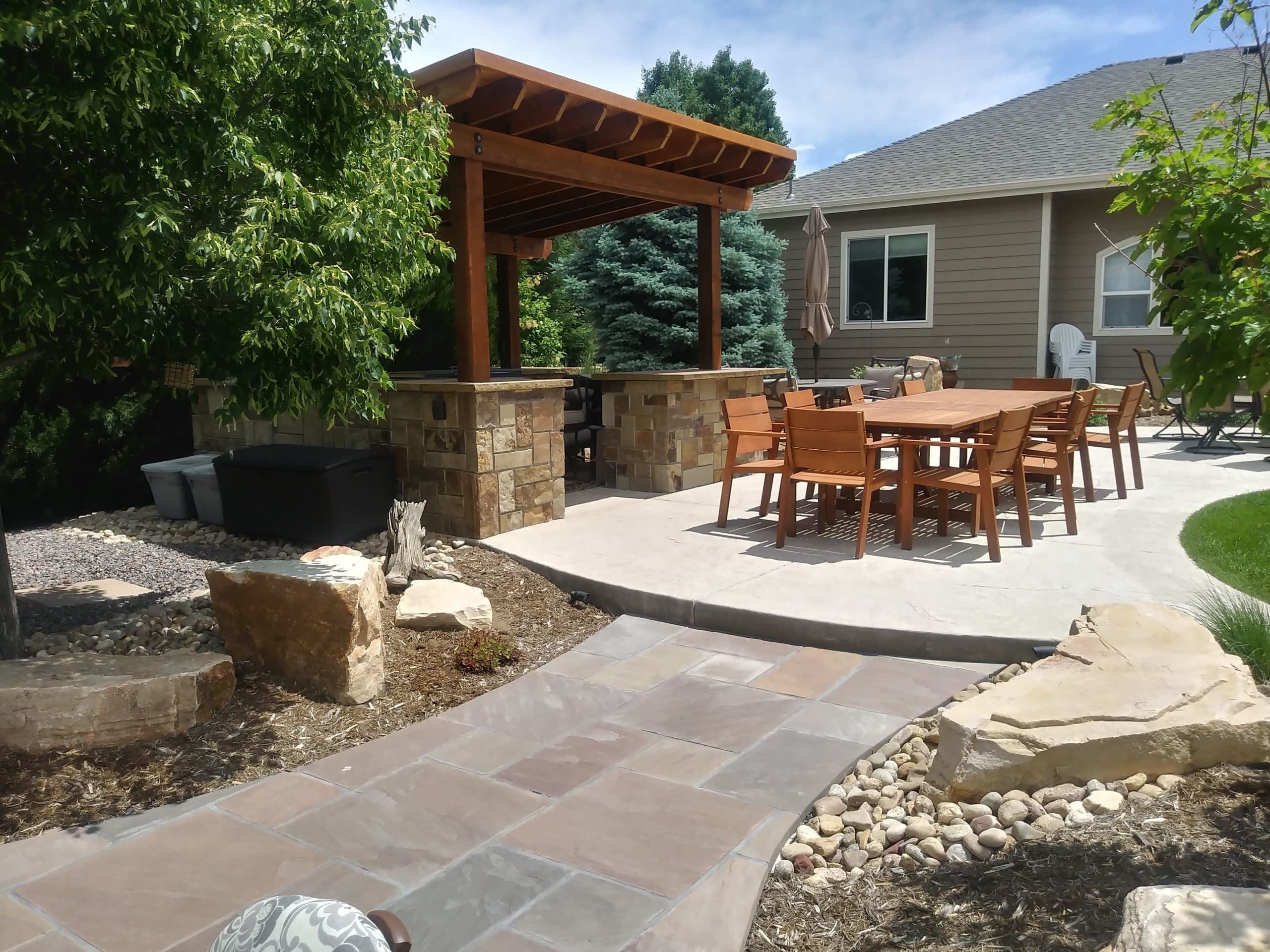 Outdoor Kitchen with patio and outdoor seating and eating area.